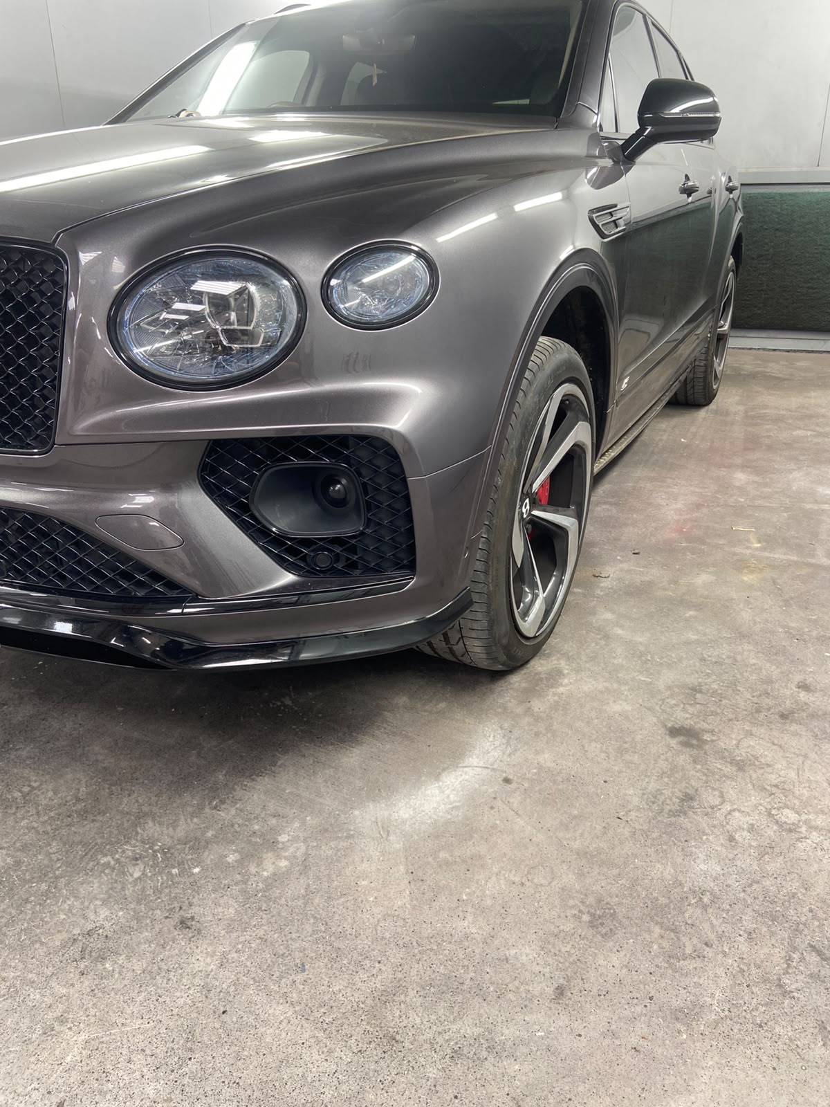 Finished Bentley Bentayga with a factory-finish nearside front wing and bumper repair
