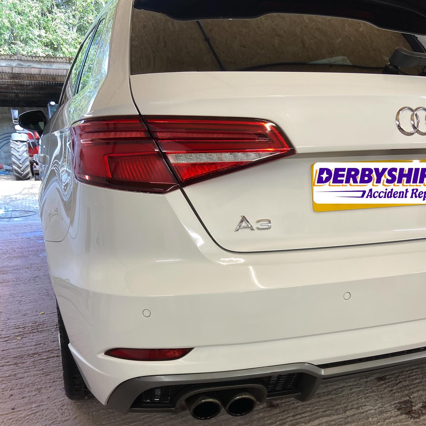 Finished Audi A3 with a factory-finish rear bumper and tailgate repair
